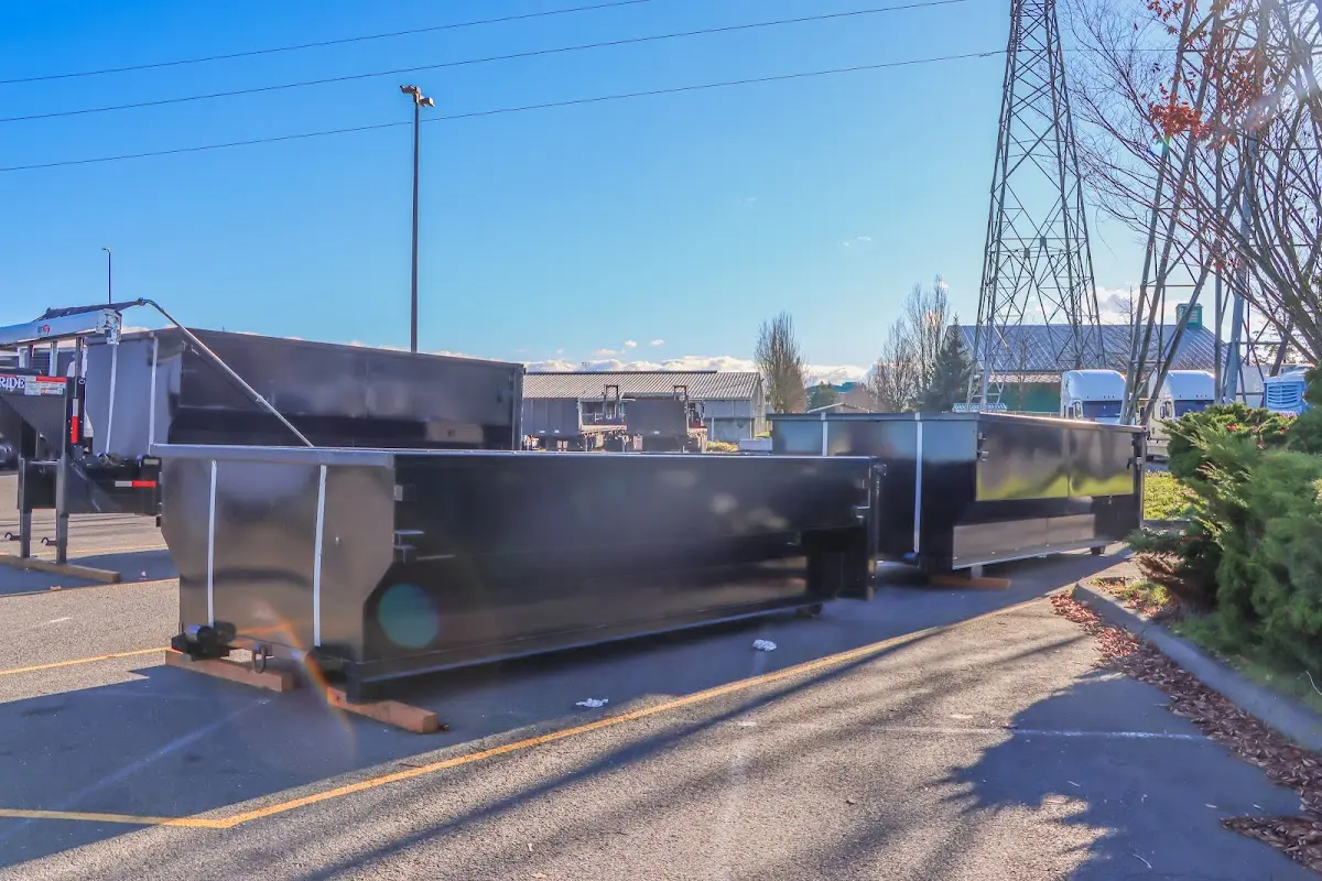 Roll-off dumpster ready for waste disposal at job site for Demolition Dumpster Rental in Van Buren
